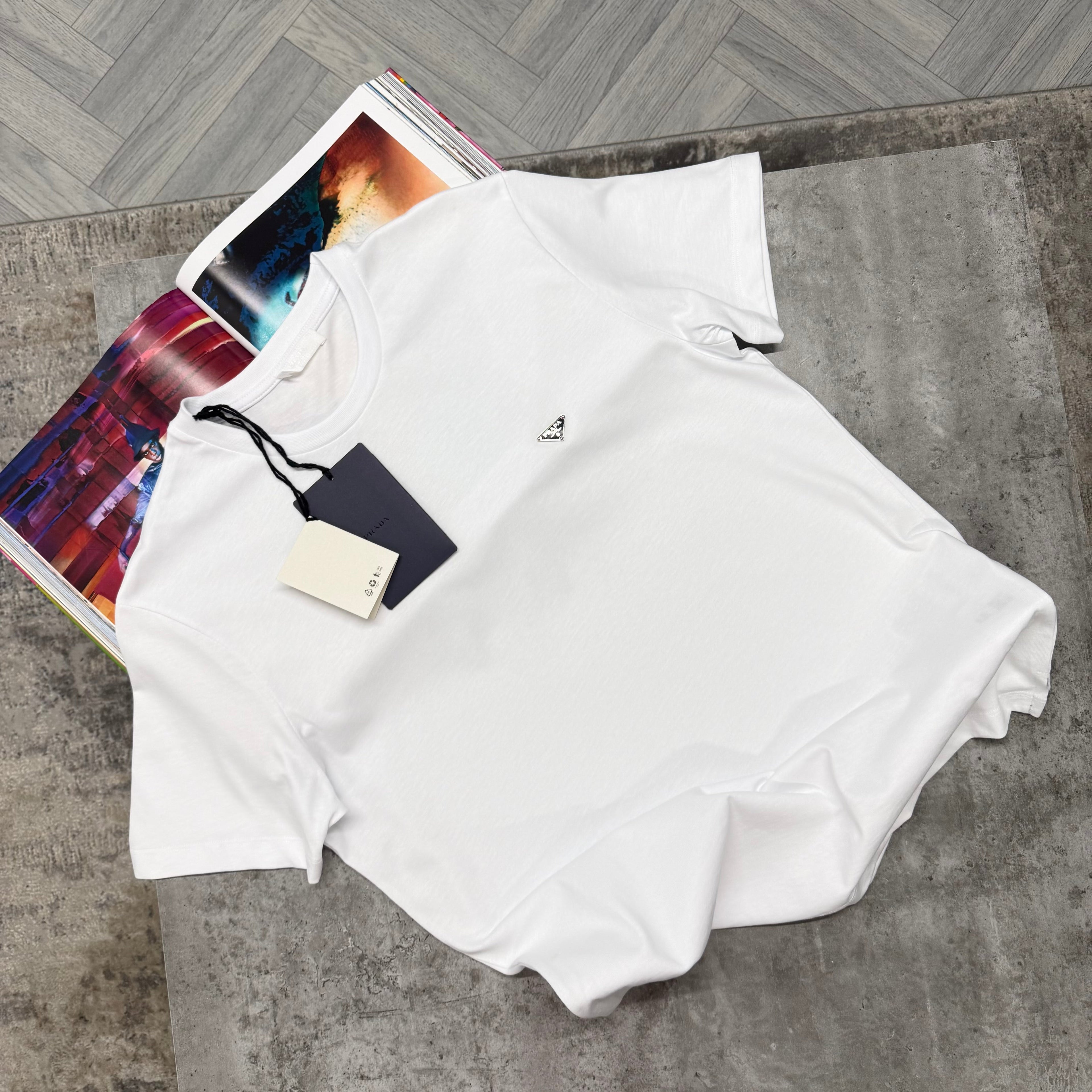 PDA SMALL SILVER BADGE T SHIRT - WHITE